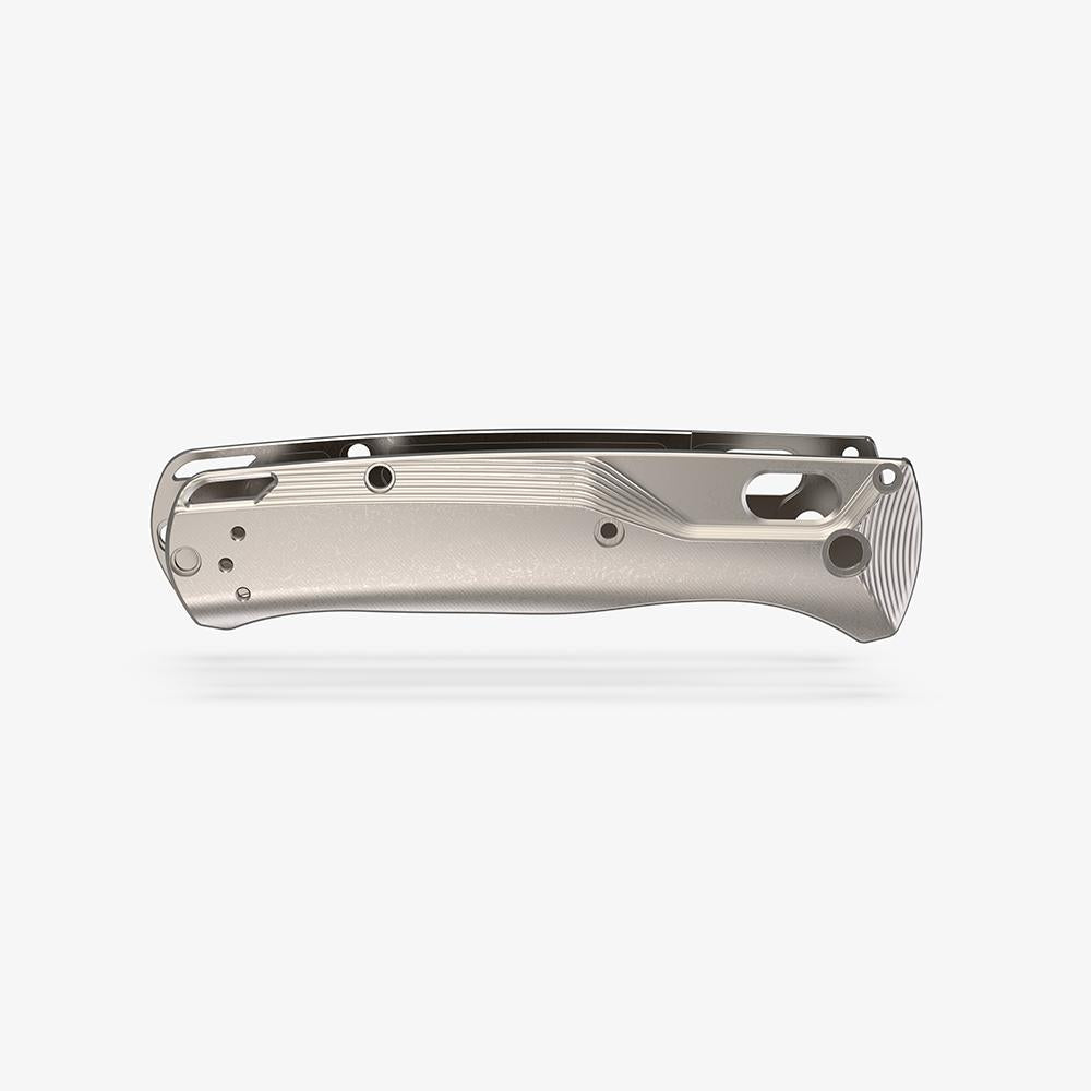 Back side view of the titanium Crossfade scales for the Benchmade Bugout knife in a stonewashfinish.