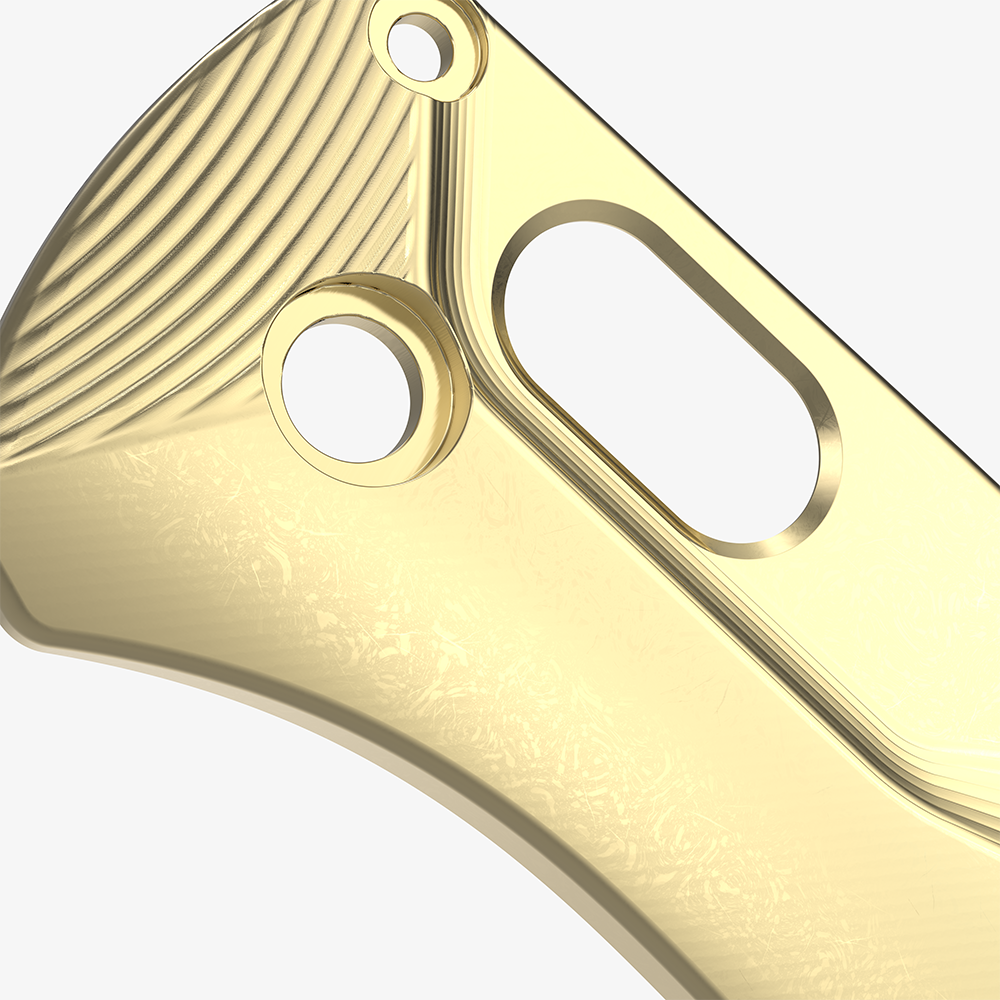 Detail shot on the custom brass Crossfade scales for the Benchmade Bugout knife.