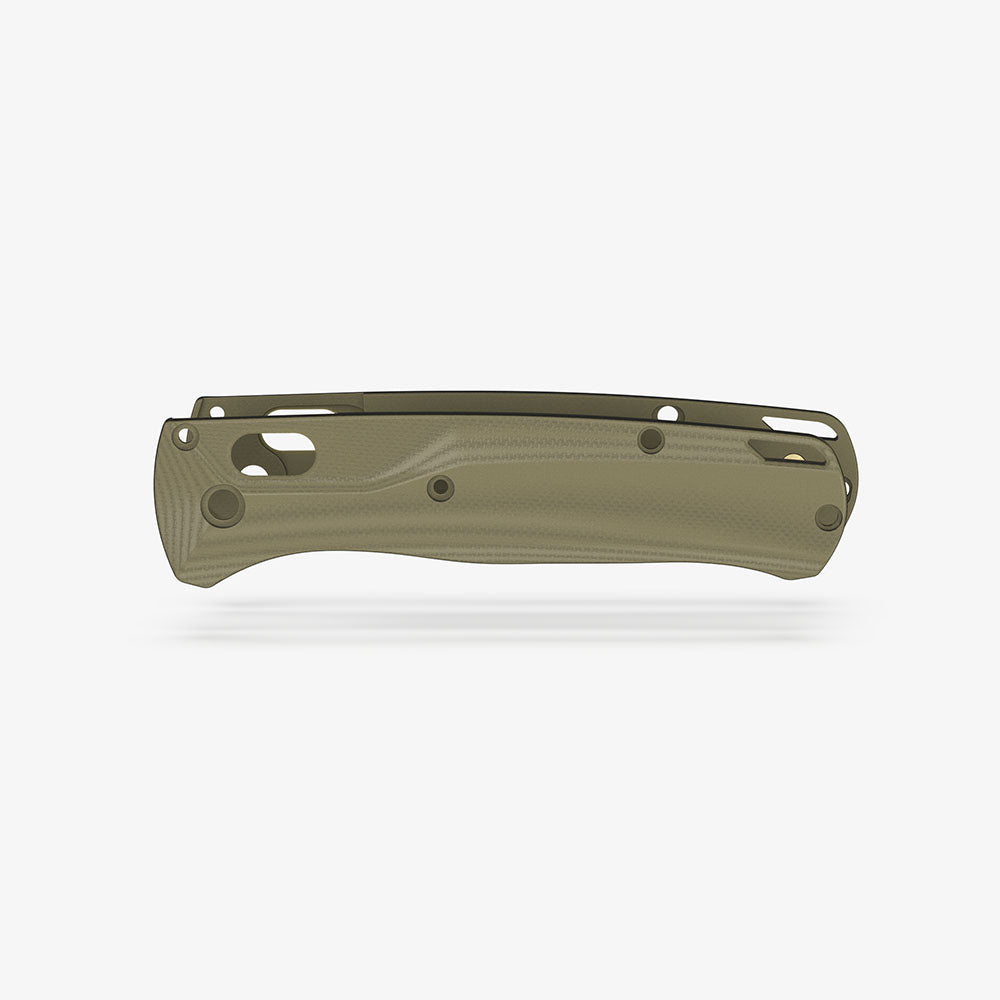 The Benchmade Bugout knife with custom Crossfade scales in OD green G-10.