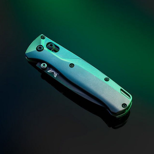 Studio shot of the Benchmade Bugout with titanium Crossfade scales.