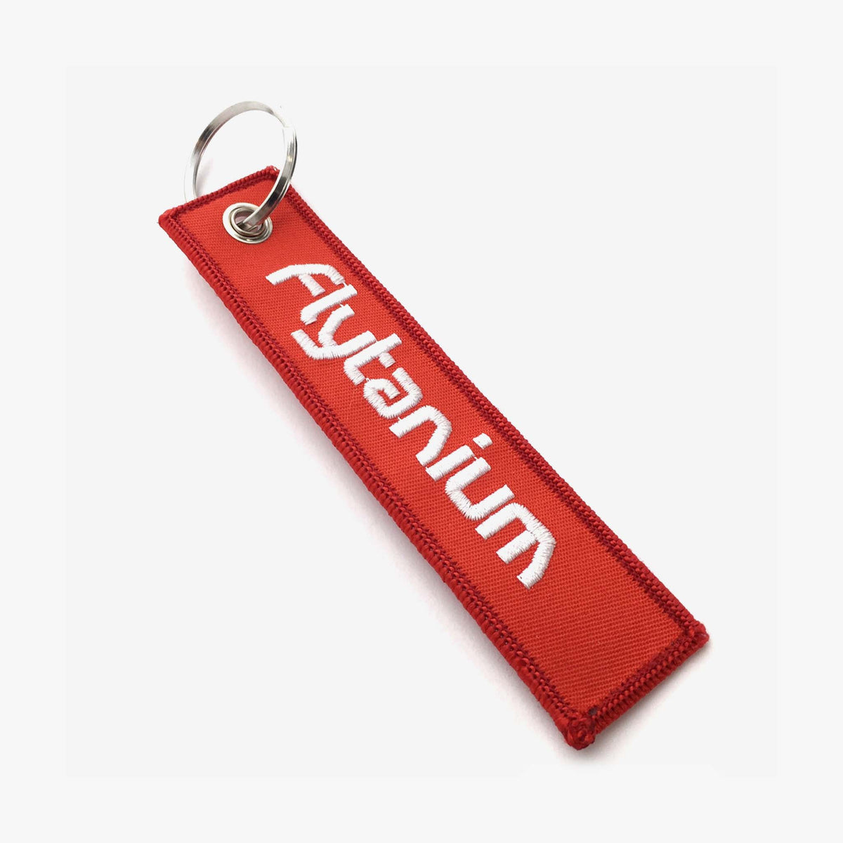 Flytanium &quot;Remove Before Flyght&quot; Tag Keychain-Red