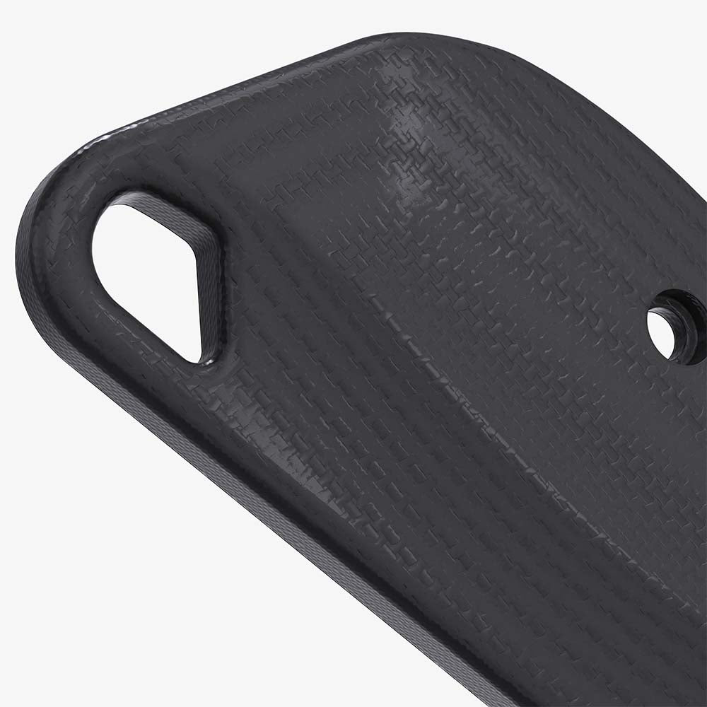 Detail shot of the Flex CRKT Minimalist scales, showing the lanyard hole in black G-10.