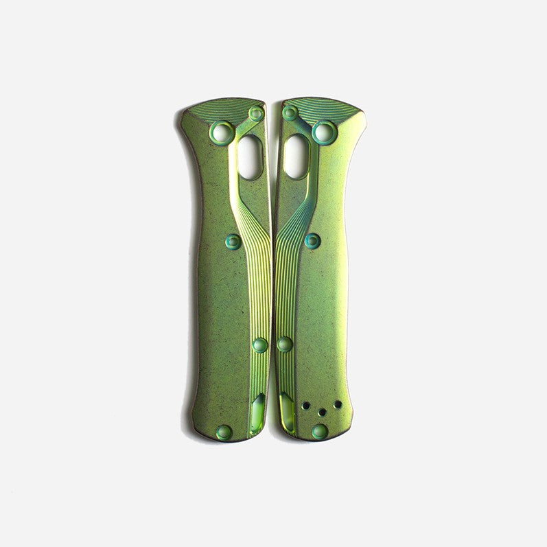 Limited edition titanium Mini Bugout scales in the europa finish, green with highlights of bronze.