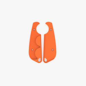 Inside view of the Flex scales for the CRKT Minimalist in orange G-10, showing the detailed and precise milling.