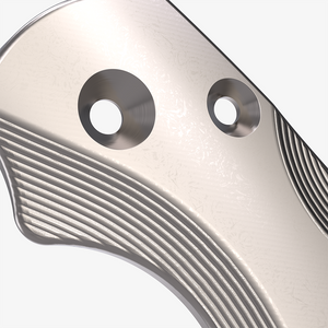 Detail shot of the titanium scales for the Spyderco Paramilitary 2 knife.