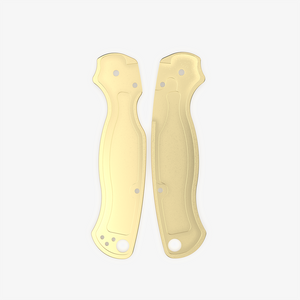Inside view of the brass scales for the Spyderco Paramilitary 2 knife, showing the detailed milling. 